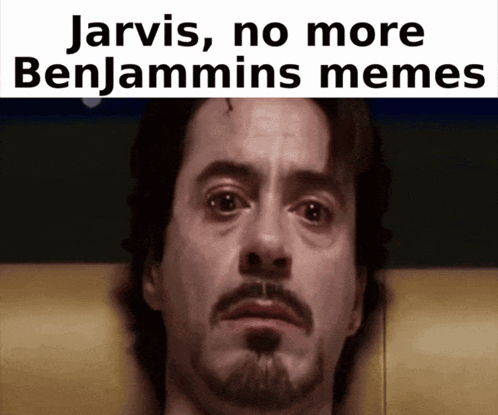 A Close Up Of A Man 'S Face With The Words Jarvis No More Benjamins Memes Above Him GIF
