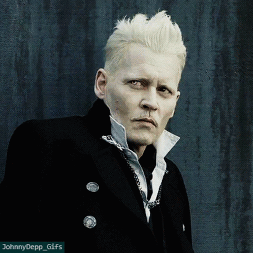 A Close Up Of A Man 'S Face With The Words Johnny Depp Gifs Below Him GIF