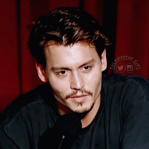 A Close Up Of A Man 'S Face With The Words Johnny Depp Gifs On The Bottom Right GIF