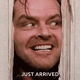 A Close Up Of A Man 'S Face With The Words `` Just Arrived '' Written Next To Him . GIF
