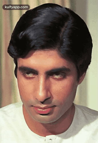 A Close Up Of A Man 'S Face With The Words Kulfyapp.com Visible GIF