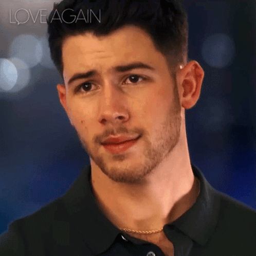 A Close Up Of A Man 'S Face With The Words Love Again Written Above Him GIF