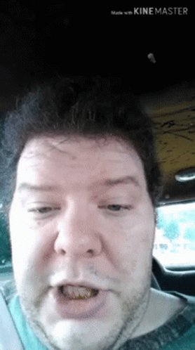 Close Up Of Man's Face With Made With Kinemaster Text GIF