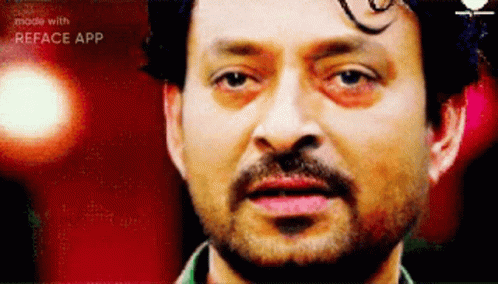 A Close Up Of A Man 'S Face With The Words Made With Reface App On The Bottom GIF