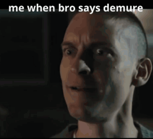 a close up of a man 's face with the words " me when bro says demure " above him