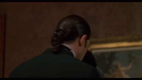A Close Up Of A Man 'S Face With The Words Misbehave Written On His Face . GIF