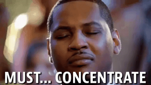 A Close Up Of A Man 'S Face With The Words Must Concentrate Above Him . GIF