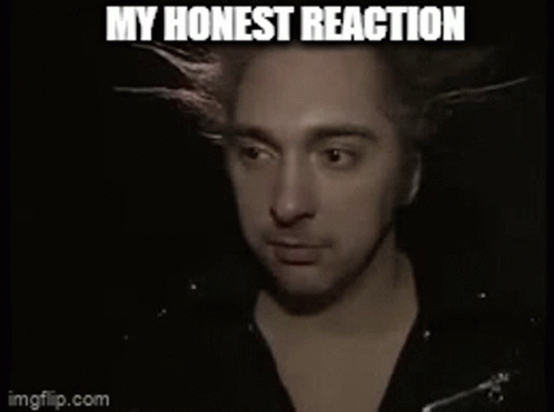 A Close Up Of A Man 'S Face With The Words My Honest Reaction GIF