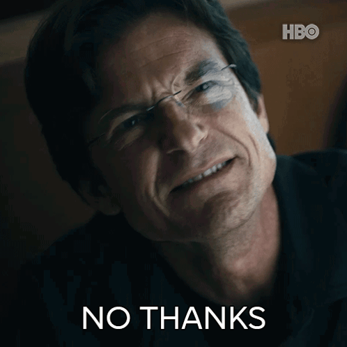 A Close Up Of A Man 'S Face With The Words " No Thanks " On The Bottom GIF