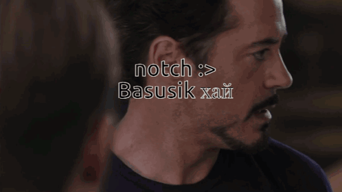 A Close Up Of A Man 'S Face With The Words Notch Basusik Xai On The Bottom GIF