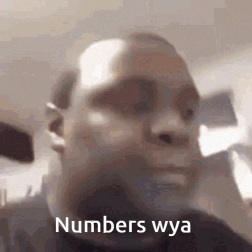 A Close Up Of A Man 'S Face With The Words Numbers Wya On It GIF