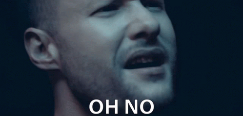 A Close Up Of A Man 'S Face With The Words Oh No Written Below Him GIF