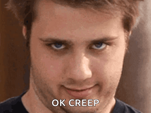 A Close Up Of A Man 'S Face With The Words Ok Creep Written On It GIF