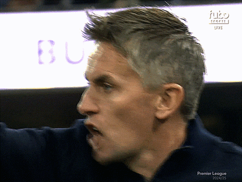 A Close Up Of A Man 'S Face With The Words Premier League Visible GIF