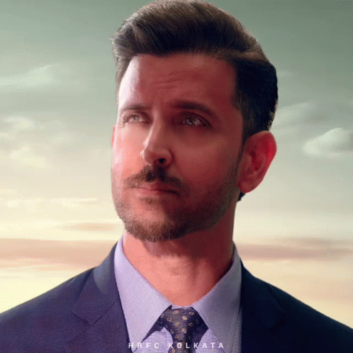 A Close Up Of A Man 'S Face With The Words Prfc Kolkata At The Bottom GIF