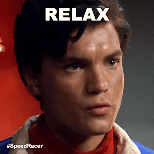 A Close Up Of A Man 'S Face With The Words Relax Written Above Him GIF