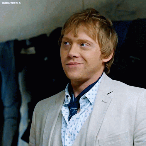 A Close Up Of A Man 'S Face With The Words Rgrintreels Visible GIF