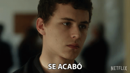 A Close Up Of A Man 'S Face With The Words Se Acabo Written Above Him GIF
