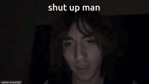 A Close Up Of A Man 'S Face With The Words Shut Up Man Written Above Him GIF