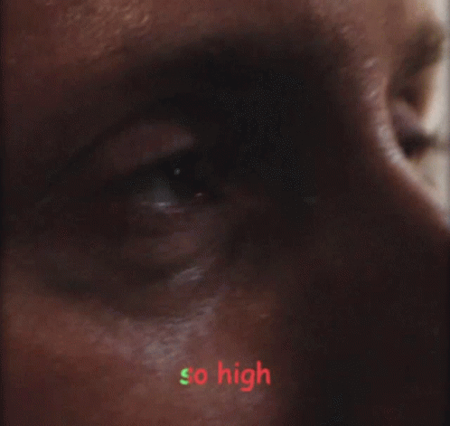 A Close Up Of A Man 'S Face With The Words So High Written In Green GIF