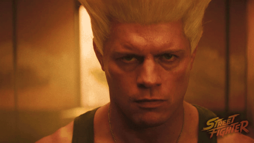 A Close Up Of A Man 'S Face With The Words Street Fighter On The Bottom Right GIF