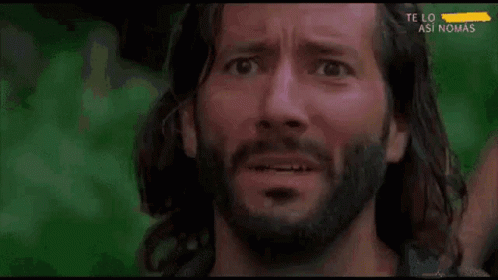 A Close Up Of A Man 'S Face With The Words Te Lo Así Nomás On The Bottom Right GIF