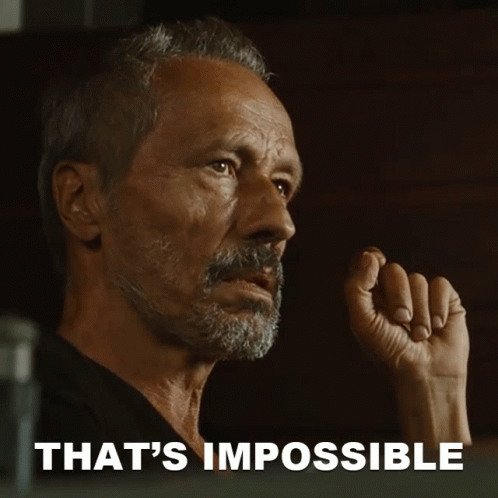 A Close Up Of A Man 'S Face With The Words That 'S Impossible GIF