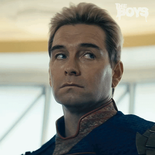 A Close Up Of A Man 'S Face With The Words The Boys On The Bottom Right GIF