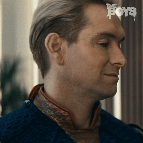 A Close Up Of A Man 'S Face With The Words " The Boys " Written On His Forehead GIF
