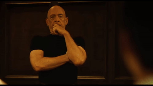 A Close Up Of A Man 'S Face With The Words " The Chess Game " On The Bottom GIF