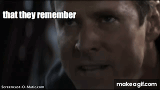 A Close Up Of A Man 'S Face With The Words `` The Night They Played The Titans '' GIF