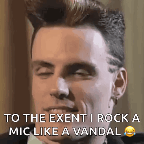 A Close Up Of A Man 'S Face With The Words To The Exent I Rock A Mic Like A Vandal GIF