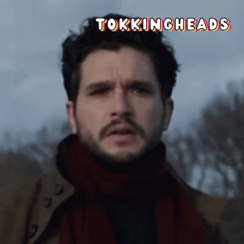 A Close Up Of A Man 'S Face With The Words " Tokingheads " Above Him GIF