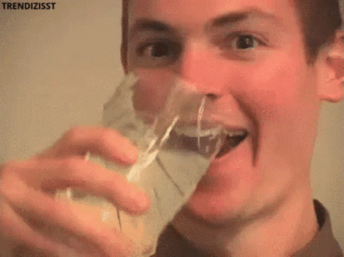 Close Up Of Man's Face With Trendizisst Above GIF