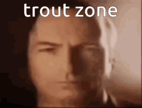 A Close Up Of A Man 'S Face With The Words Trout Zone Written Above Him GIF