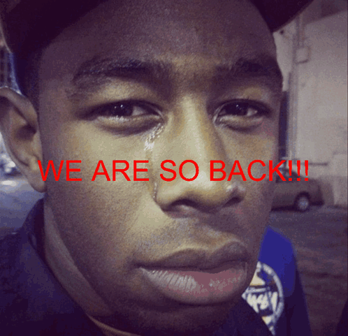 A Close Up Of A Man 'S Face With The Words We Are So Back Written In Red GIF