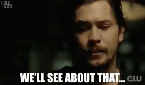 A Close Up Of A Man 'S Face With The Words `` We 'Ll See About That '' Written Below Him . GIF