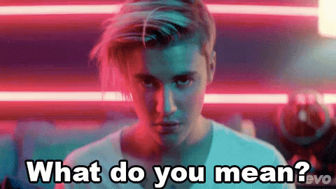 A Close Up Of A Man 'S Face With The Words What Do You Mean . GIF
