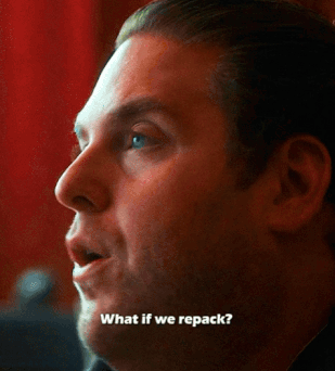 a close up of a man 's face with the words " what if we repack " below him