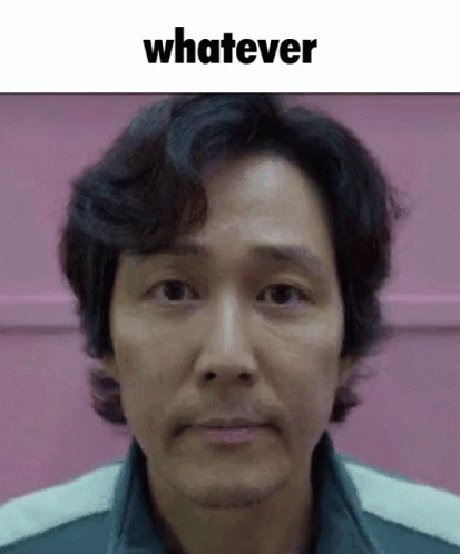 A Close Up Of A Man 'S Face With The Words " Whatever " Above Him GIF