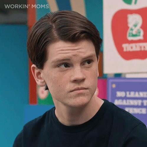 A Close Up Of A Man 'S Face With The Words Workin ' Moms On The Bottom Right GIF