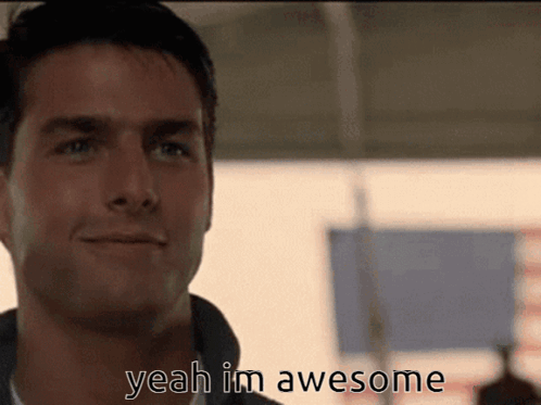 A Close Up Of A Man 'S Face With The Words Yeah Im Awesome Above Him GIF