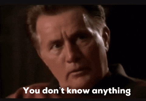 A Close Up Of A Man 'S Face With The Words You Don 'T Know Anything Below It GIF