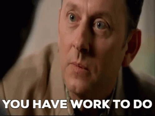 A Close Up Of A Man 'S Face With The Words `` You Have Work To Do '' Written On It . GIF