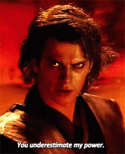 A Close Up Of A Man 'S Face With The Words You Underestimate My Power GIF