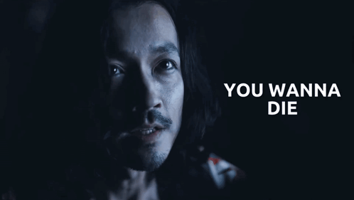 A Close Up Of A Man 'S Face With The Words You Wanna Die Behind Him GIF