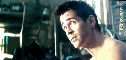 A Close Up Of A Man 'S Face With The Year 2023 Visible GIF
