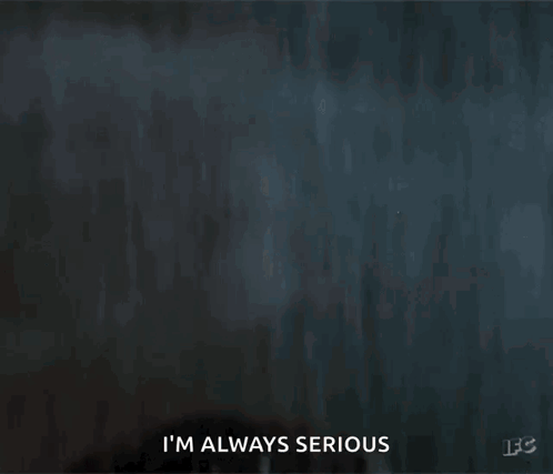 A Close Up Of A Man 'S Face With Water Drops On It And The Words I 'M Always Serious . GIF