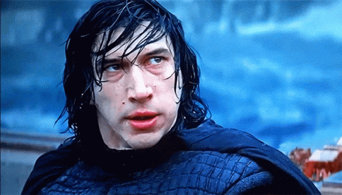 A Close Up Of A Man 'S Face With Wet Hair GIF