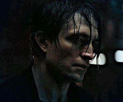 A Close Up Of A Man 'S Face With Wet Hair On It GIF